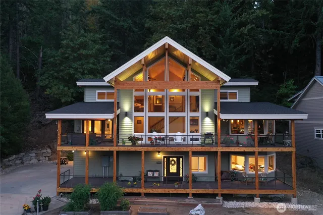 a front view of a residential apartment building with a yard