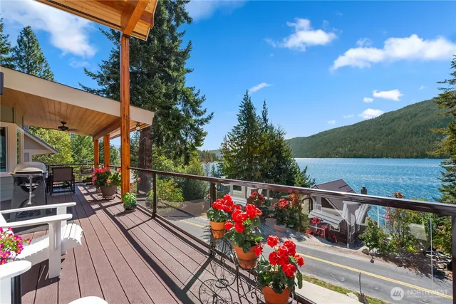a view of a balcony with wooden floor
