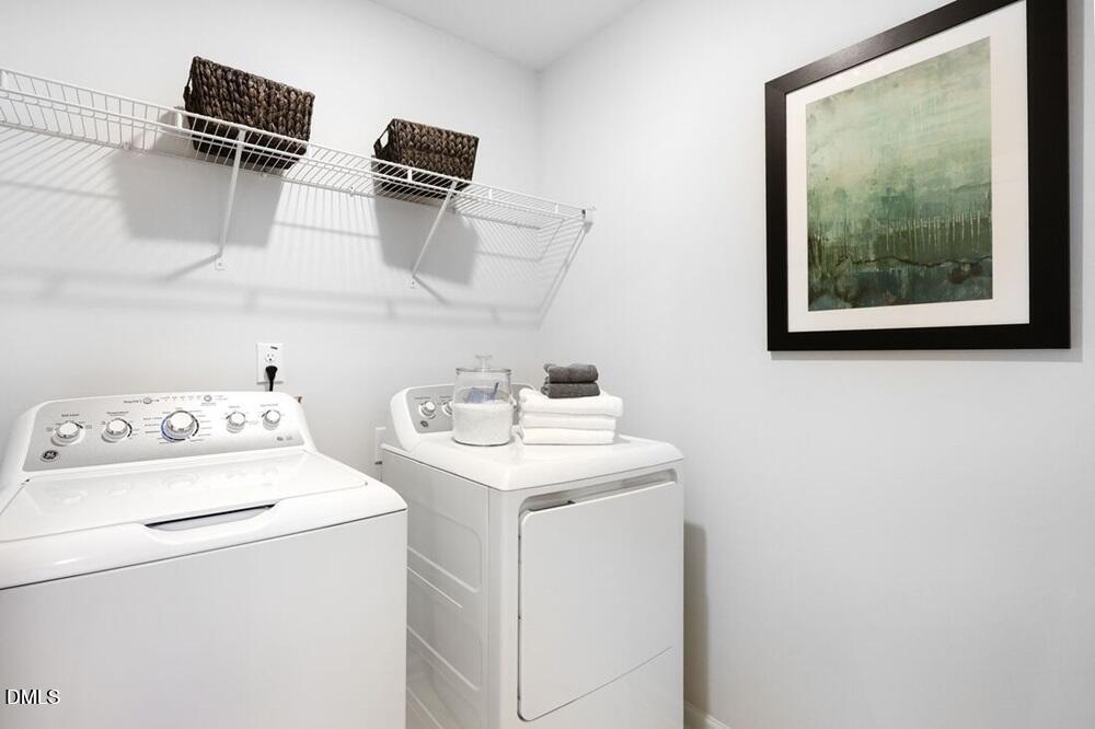 1324 West Garner Road, Unit 104 Garner, NC 27529 - Photo 22 of 23 a utility room with dryer and washer