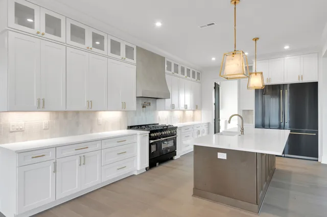 a bathroom with a bathtub and a sink
