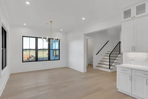a bathroom with a double vanity sink and mirror