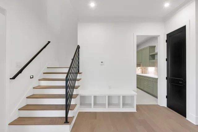 a view of an empty room with empty shelves