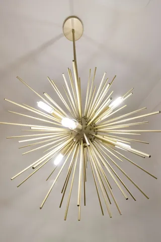 a bathroom with a toilet sink vanity and mirror