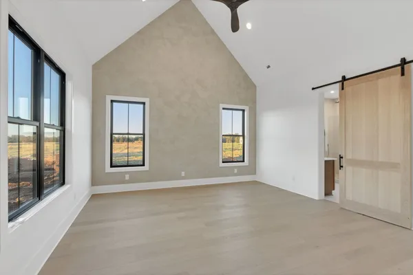 an empty room with windows