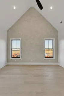 an empty room with windows