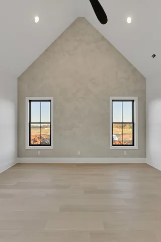 an empty room with windows