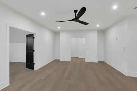 an aerial view of a house with a big yard