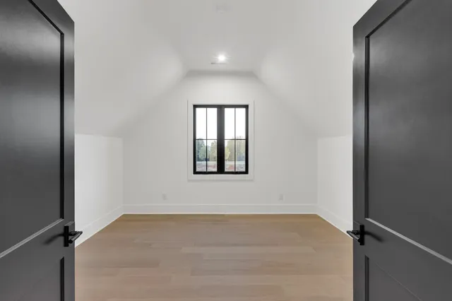 an aerial view of a house with outdoor space
