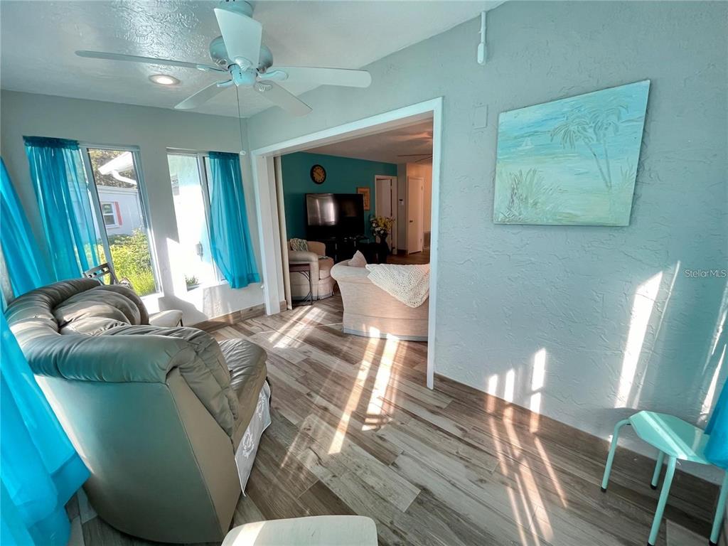 3495 Tree Line Court, Unit 8 Sarasota, FL 34231 - Photo 18 of 40 a living room with furniture