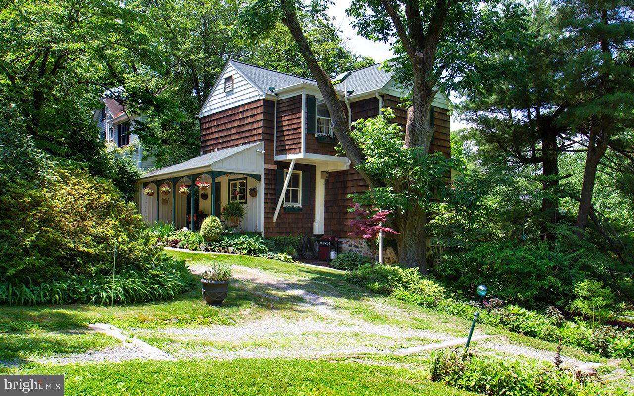 5137 Wetheredsville Road Baltimore, MD 21207 - Photo 5 of 89 a front view of a house with a yard