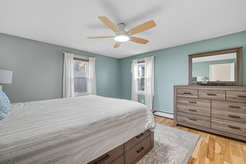 3 Nantucket Avenue Swampscott, MA 01907 - Photo 19 of 41 a bedroom with a bed and a dresser
