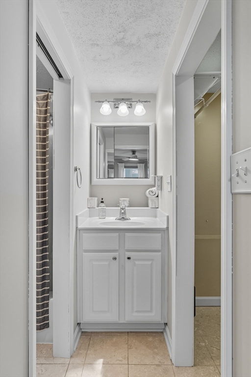 3 Nantucket Avenue Swampscott, MA 01907 - Photo 21 of 41 a bathroom with a sink and a mirror