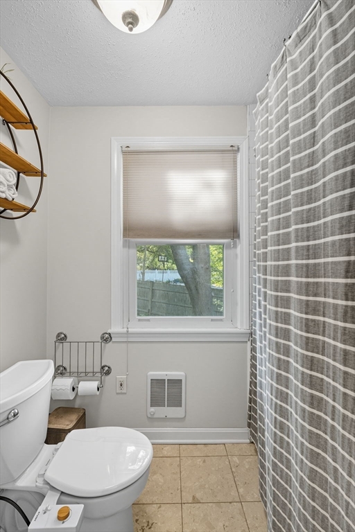 3 Nantucket Avenue Swampscott, MA 01907 - Photo 22 of 41 a bathroom with a toilet a sink and a mirror