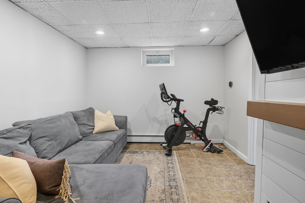 3 Nantucket Avenue Swampscott, MA 01907 - Photo 29 of 41 a living room with furniture a air conditioner vent and a rug
