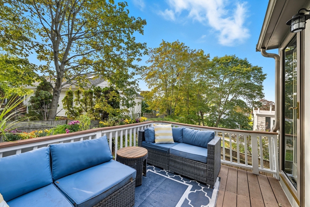 3 Nantucket Avenue Swampscott, MA 01907 - Photo 32 of 41 a balcony with wooden floor and outdoor seating