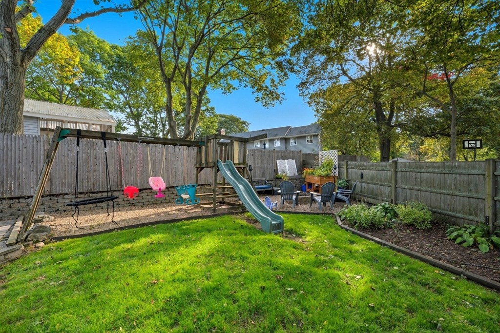 3 Nantucket Avenue Swampscott, MA 01907 - Photo 35 of 41 a view of a backyard with a slide and a slide