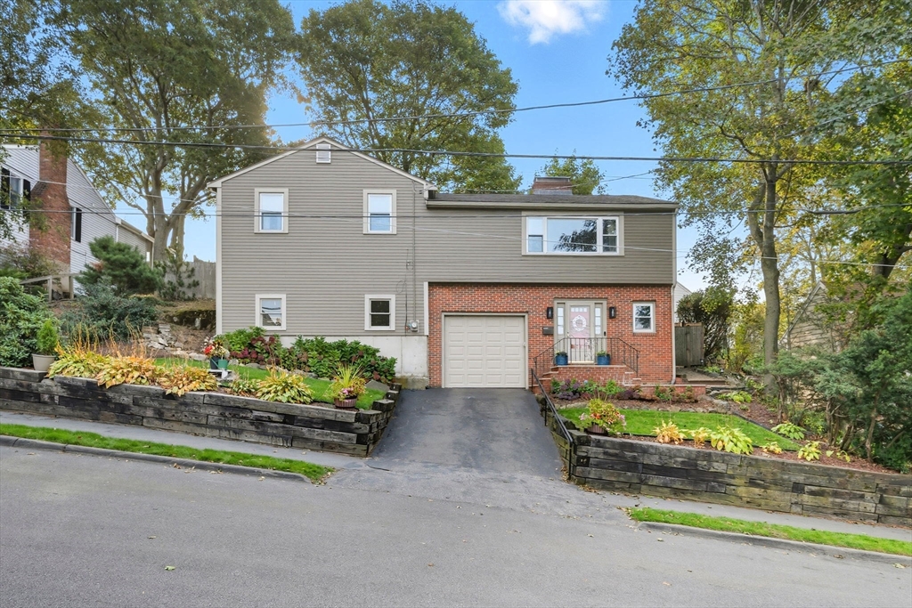 3 Nantucket Avenue Swampscott, MA 01907 - Photo 37 of 41 front view of a house with a small yard