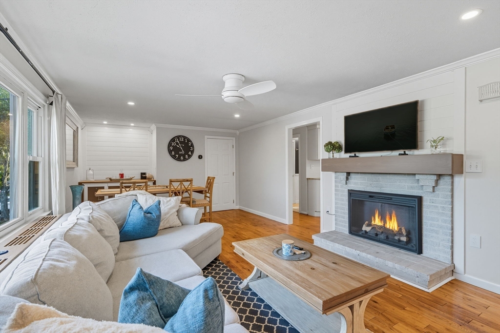 3 Nantucket Avenue Swampscott, MA 01907 - Photo 5 of 41 a living room with furniture and a fireplace