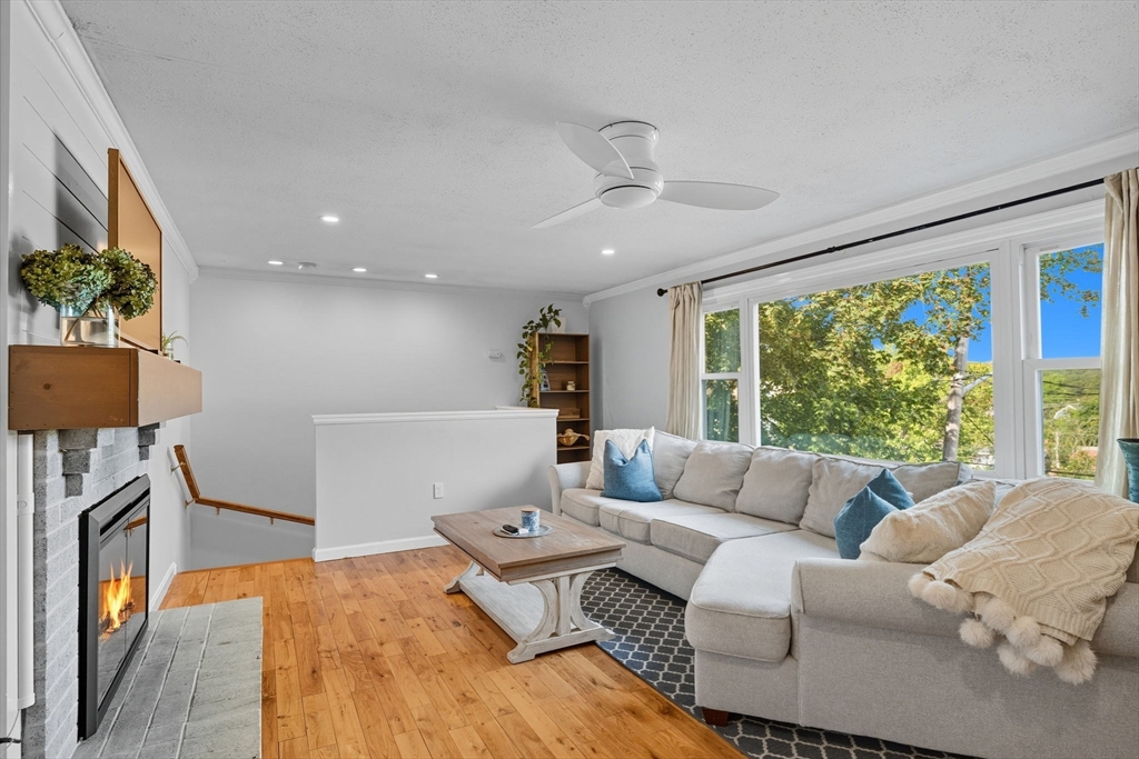 3 Nantucket Avenue Swampscott, MA 01907 - Photo 7 of 41 a living room with furniture a large window and a flat screen tv