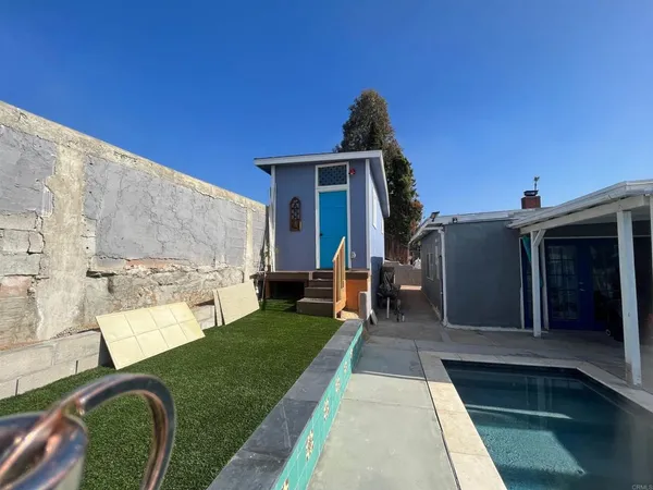a house view with a garden space