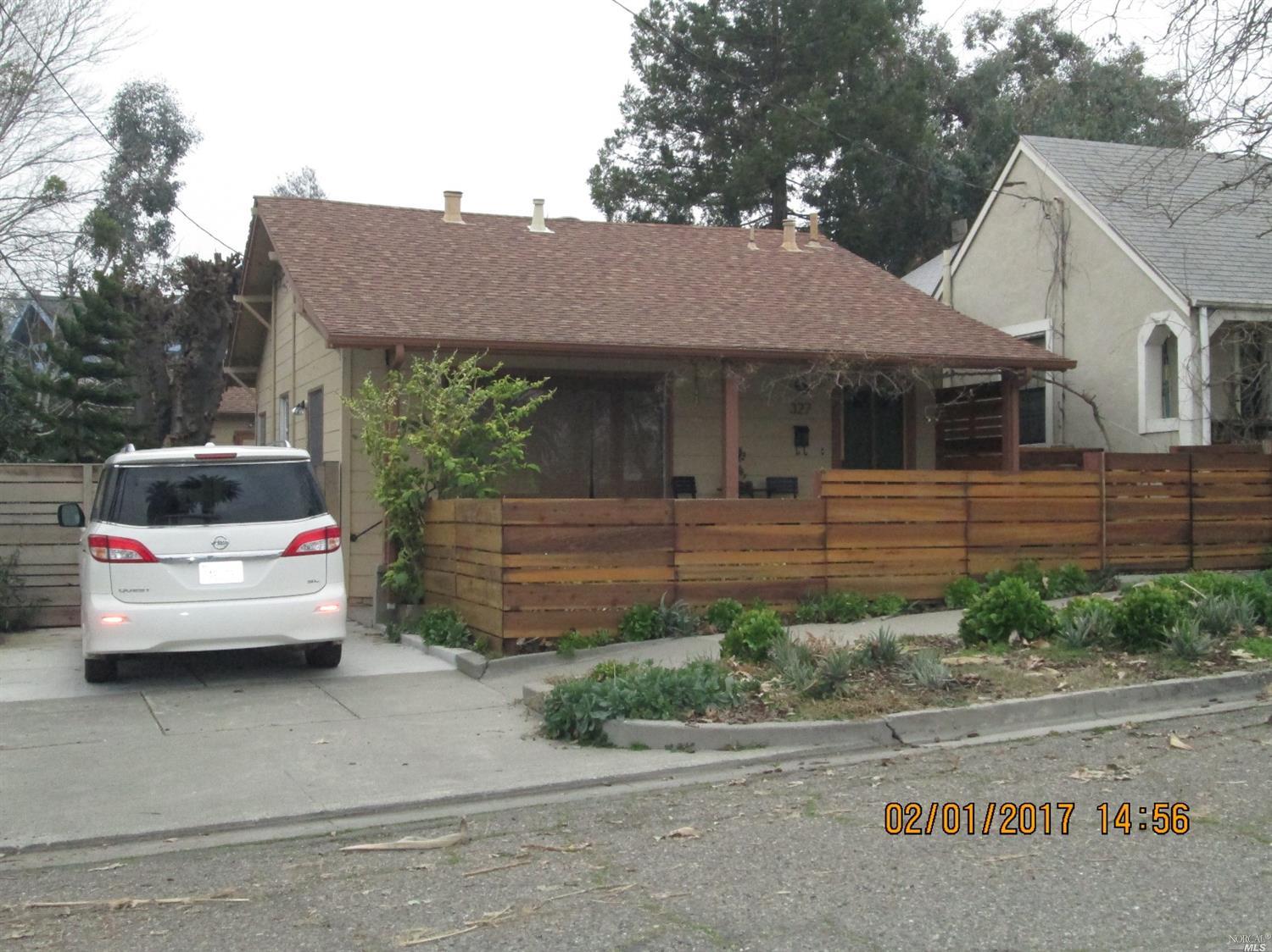 327 California Street Rio Vista, CA 94571 - Photo 1 of 1 a front view of a house with garage