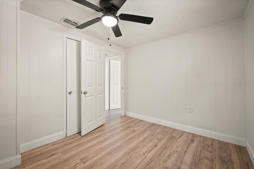 7903 New Kings Road Jacksonville, FL 32219 - Photo 19 of 28 wooden floor in an empty room