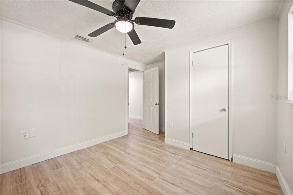 7903 New Kings Road Jacksonville, FL 32219 - Photo 21 of 28 wooden floor in an empty room