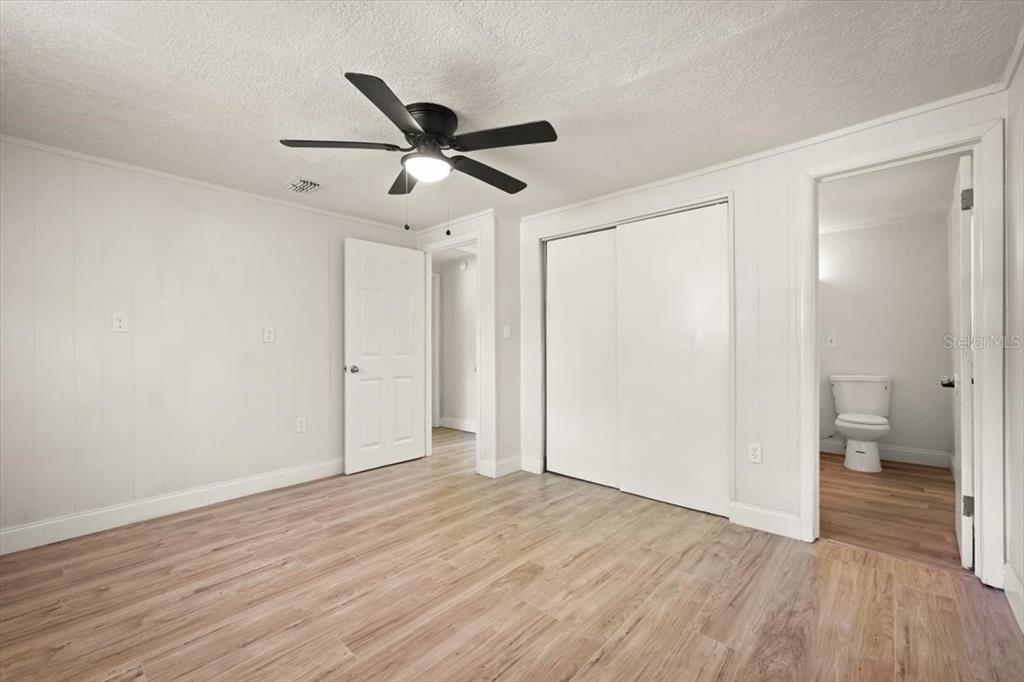 7903 New Kings Road Jacksonville, FL 32219 - Photo 25 of 28 a view of empty room with wooden floor