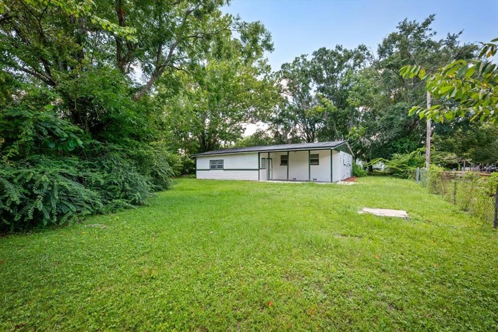 7903 New Kings Road Jacksonville, FL 32219 - Photo 28 of 28 a house view with a sitting space and garden