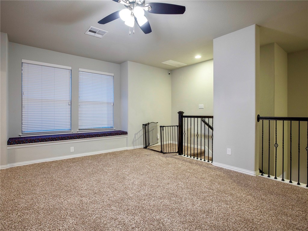 3401 Venezia View Leander, TX 78641 - Photo 32 of 40 Bay Window and Equipped with a Ceiling Fan