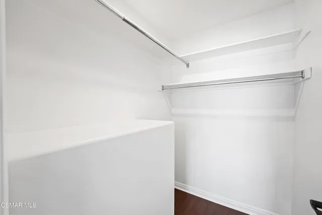 a view of cabinets with wooden floor