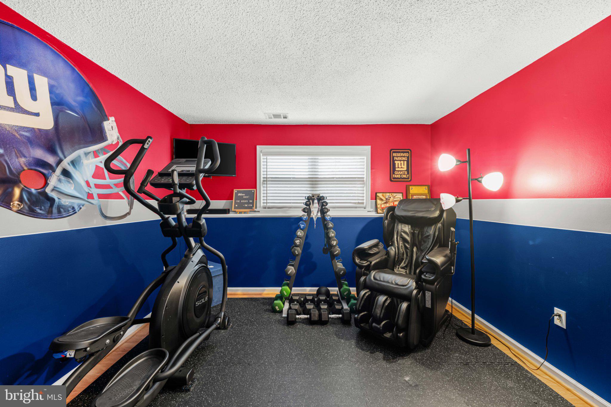 8 Dan Road Hamilton, NJ 08620 - Photo 28 of 49 Vibrant home gym with team spirit.