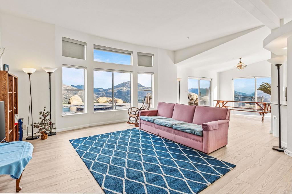 15351 Isla Vista Road Jamul, CA 91935 - Photo 11 of 40 a living room with furniture and a large window