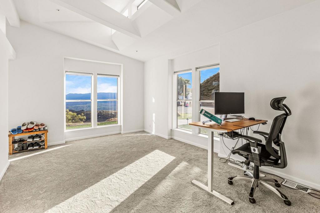 15351 Isla Vista Road Jamul, CA 91935 - Photo 13 of 40 a workspace with furniture and a window