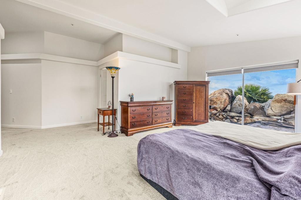 15351 Isla Vista Road Jamul, CA 91935 - Photo 15 of 40 a bedroom with a bed and dresser