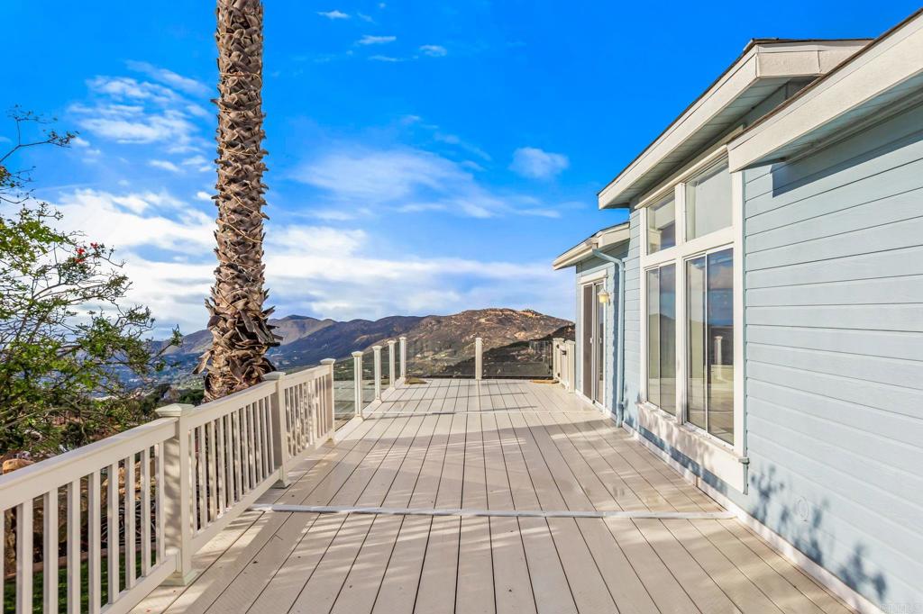 15351 Isla Vista Road Jamul, CA 91935 - Photo 23 of 40 a view of a balcony with wooden floor and fence