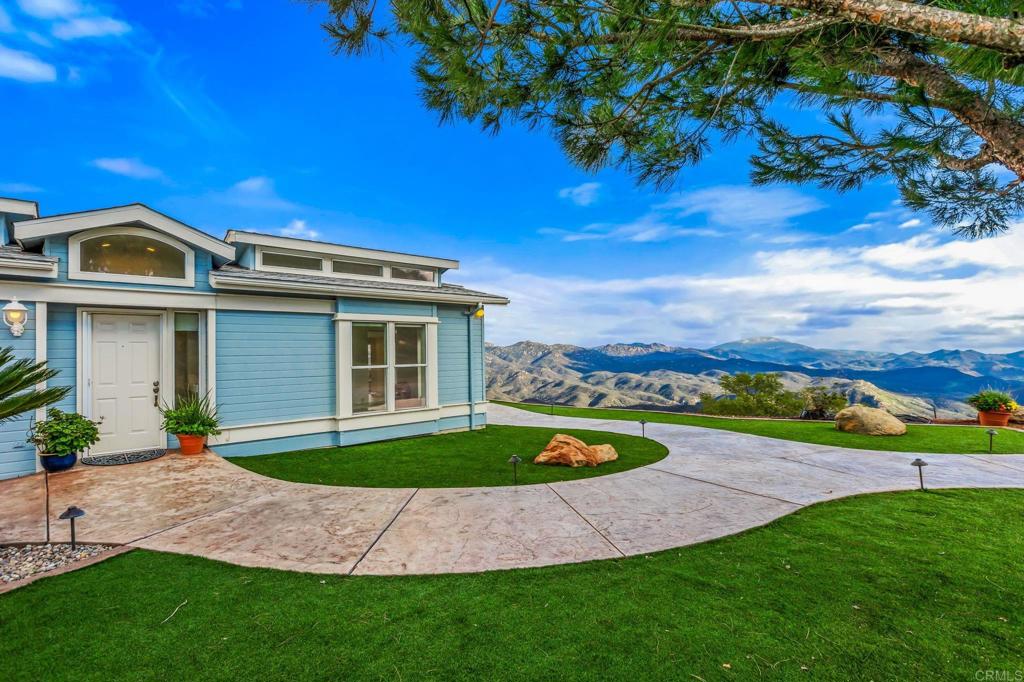 15351 Isla Vista Road Jamul, CA 91935 - Photo 35 of 40 a view of a house with a swimming pool