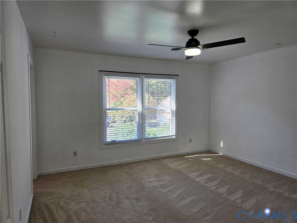 5716 Saddle Hill Drive Midlothian, VA 23112 - Photo 14 of 26 an empty room with a window