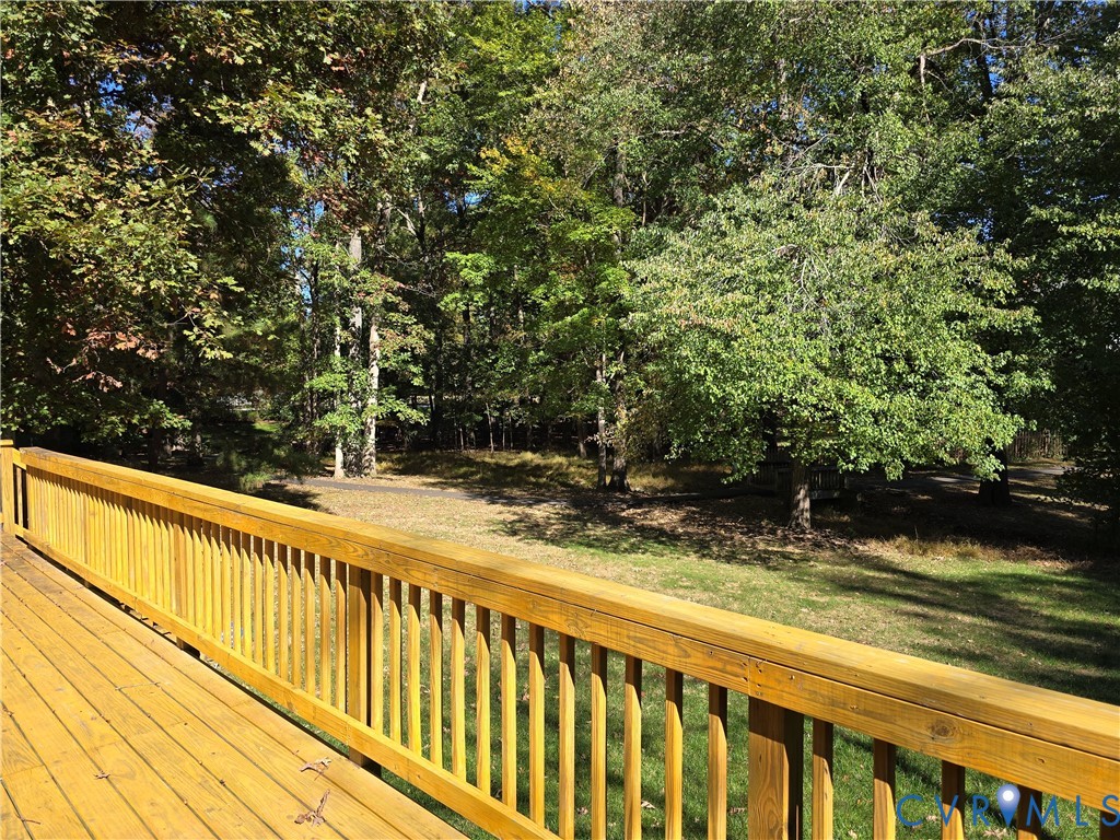 5716 Saddle Hill Drive Midlothian, VA 23112 - Photo 25 of 26 a view of balcony with wooden floor and fence