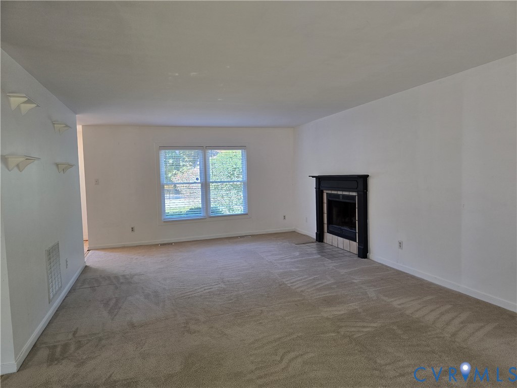 5716 Saddle Hill Drive Midlothian, VA 23112 - Photo 4 of 26 an empty room with a window