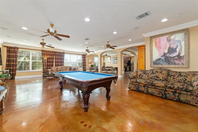 a bedroom with a bed and a table