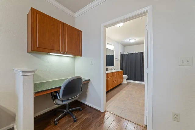 a bathroom with a double vanity sink and mirror