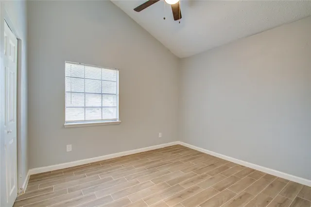 an empty room with a empty space and a window