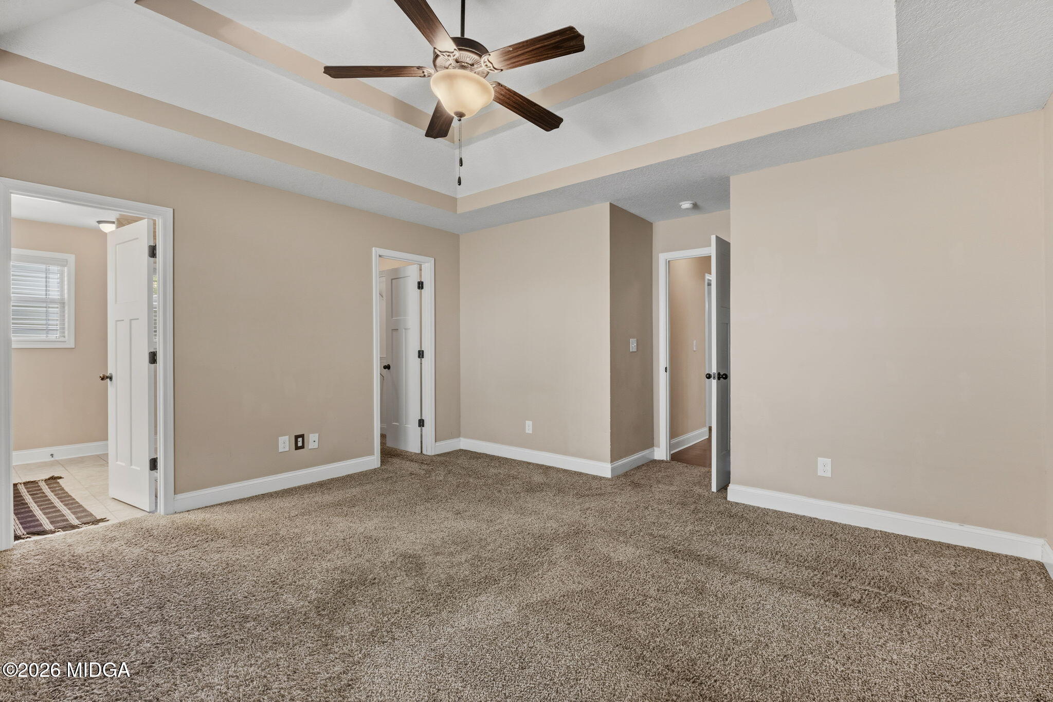 109 Hawks Rdg Trace Byron, GA 31008 - Photo 11 of 26 an empty room with closet and a chandelier fan