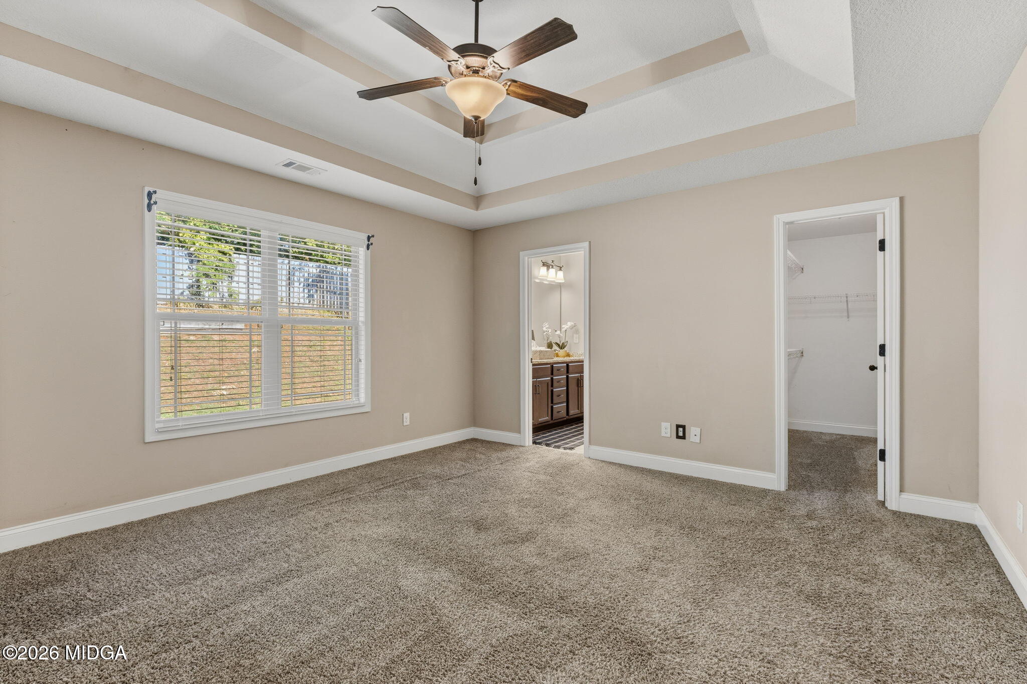 109 Hawks Rdg Trace Byron, GA 31008 - Photo 13 of 26 an empty room with fan and windows