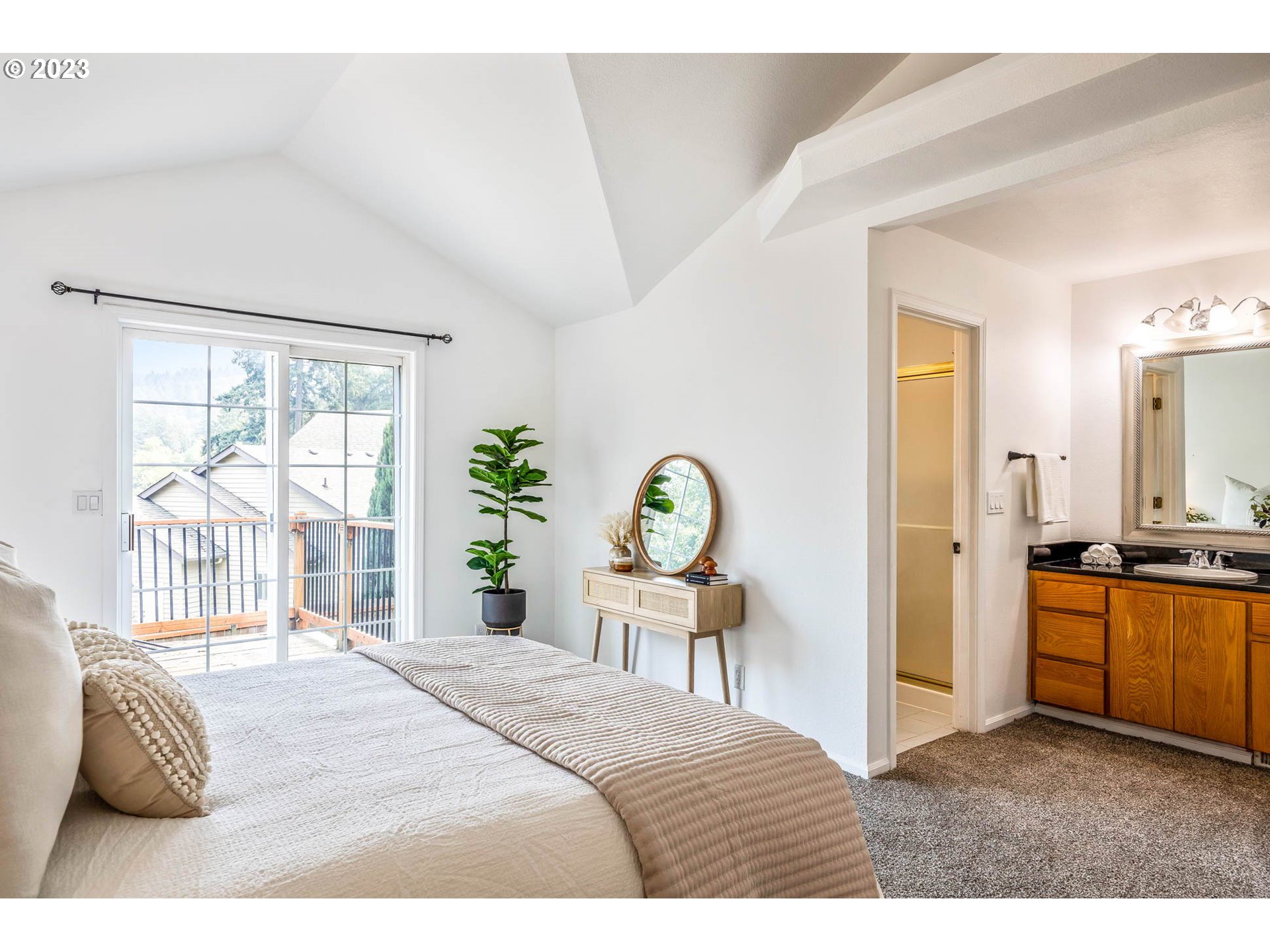 789 South 69th Street Springfield, OR 97478 - Photo 11 of 46 a bedroom with a bed and a large window