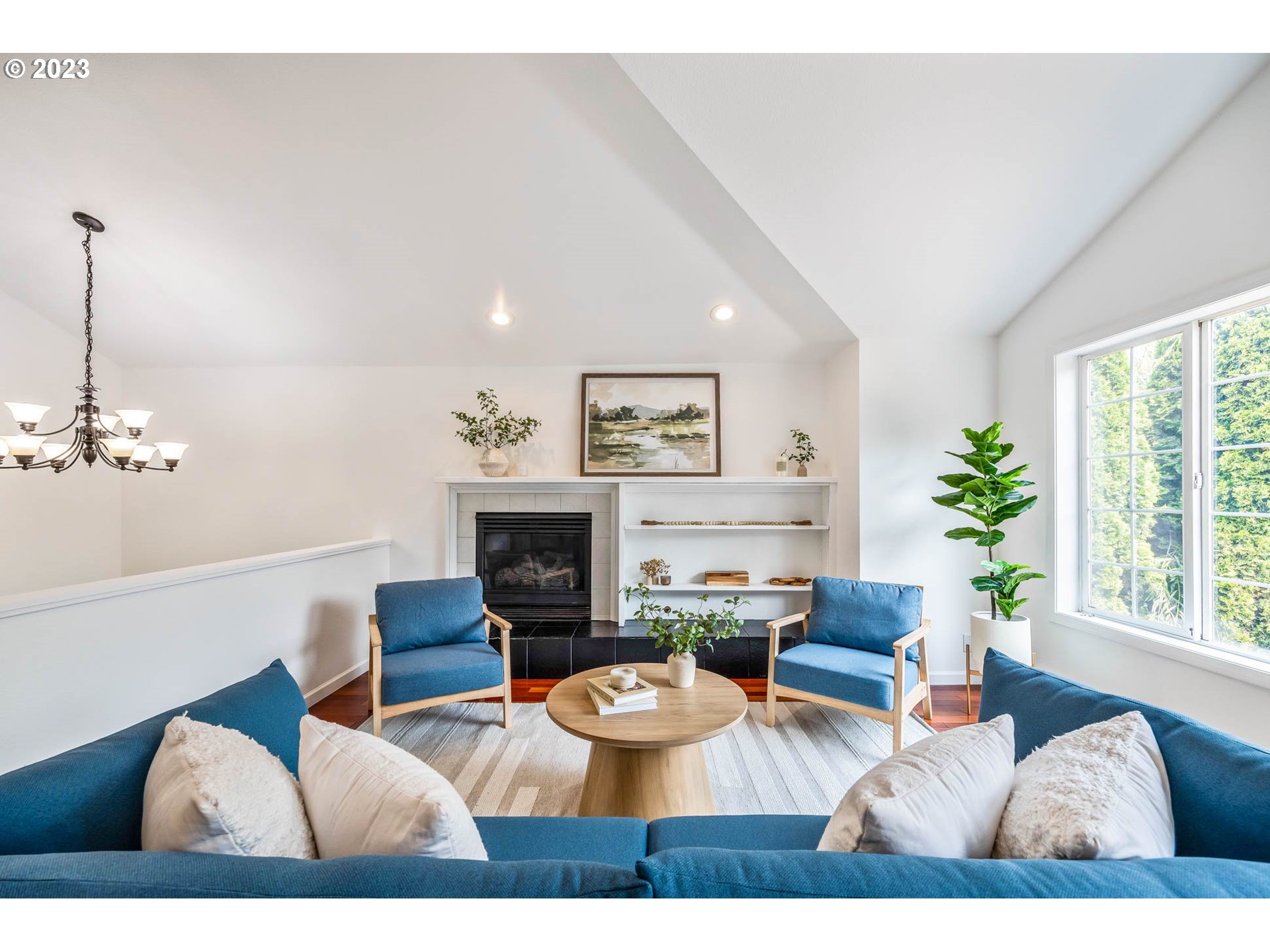 789 South 69th Street Springfield, OR 97478 - Photo 30 of 46 a living room with furniture and a fireplace