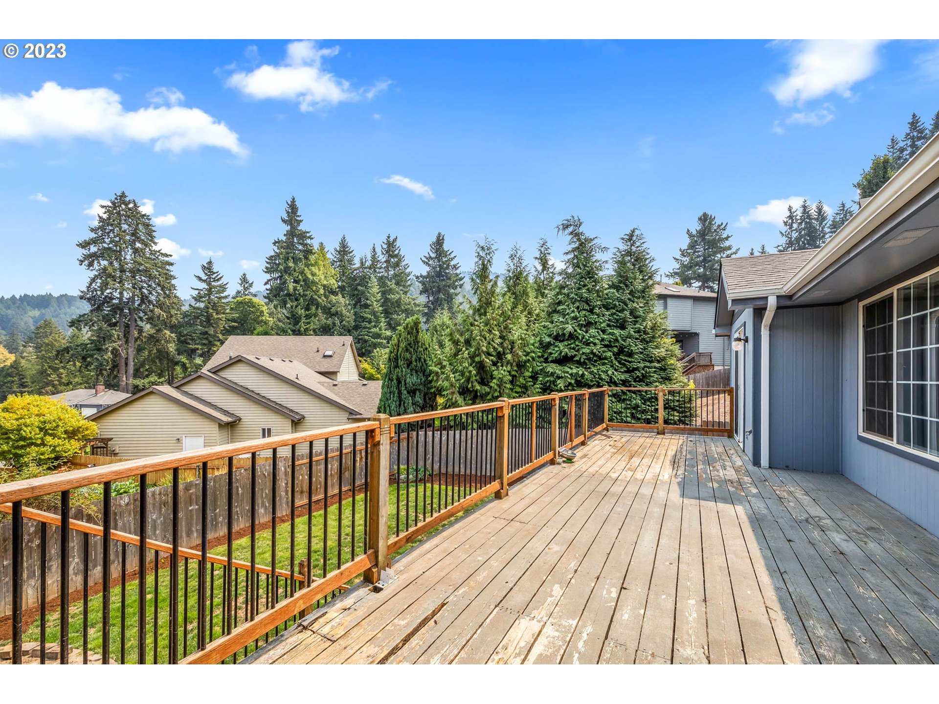 789 South 69th Street Springfield, OR 97478 - Photo 42 of 46 a view of balcony with wooden floor and fence