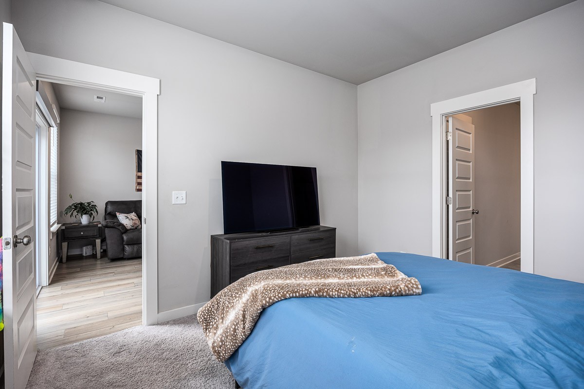 717 Mickelson Way Lebanon, TN 37087 - Photo 11 of 28 a bedroom with a bed and a television