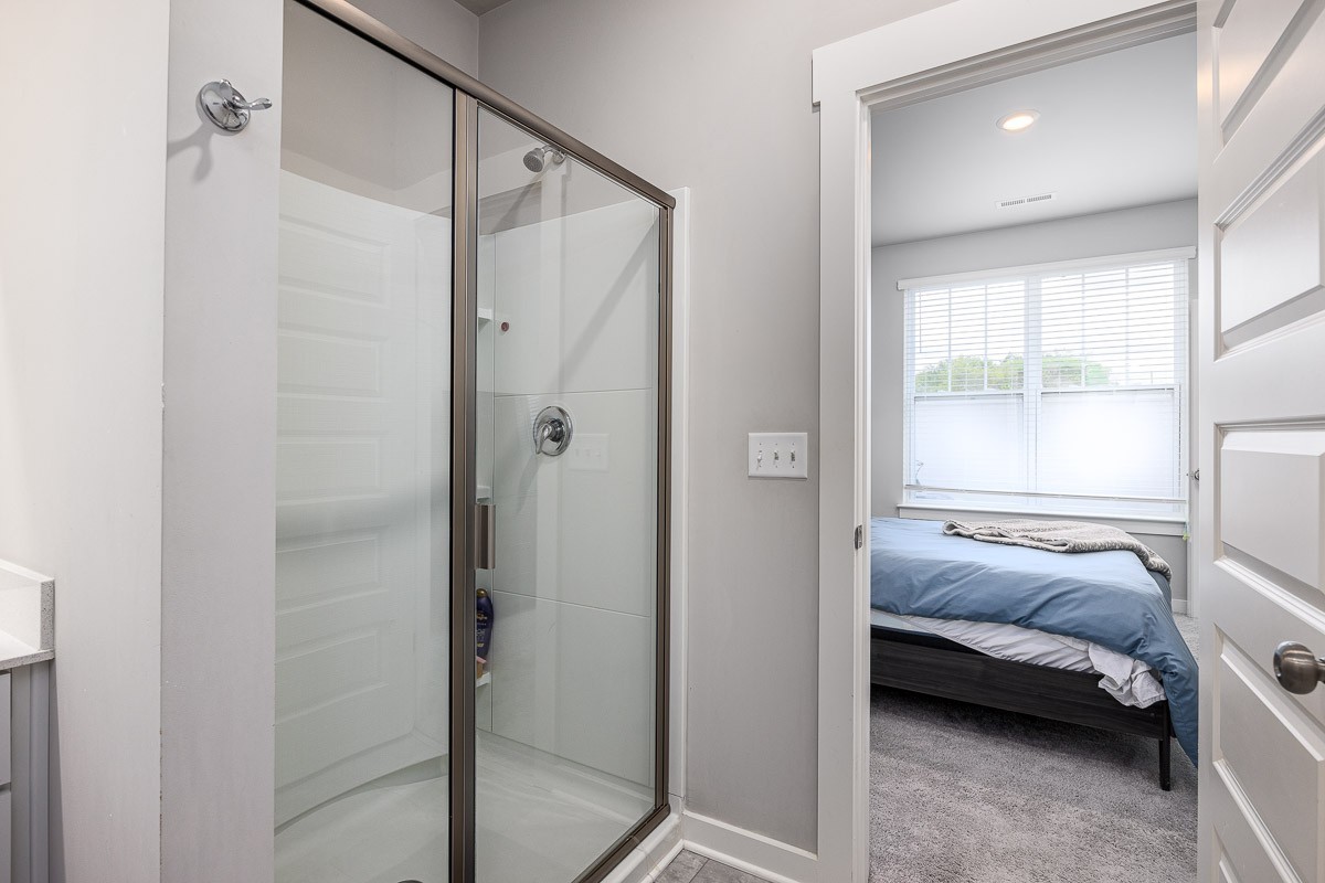 717 Mickelson Way Lebanon, TN 37087 - Photo 13 of 28 a bedroom with a bed and a window